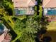 Home with a large pool and spa, surrounded by lush greenery at 1269 Western Pine Cir, Sarasota, FL 34240