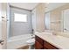 Clean bathroom with a bathtub, toilet and modern vanity at 1269 Western Pine Cir, Sarasota, FL 34240
