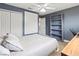 Bedroom with a double bed, built-in shelves, and closet at 1269 Western Pine Cir, Sarasota, FL 34240