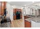 Kitchen with granite countertops, dark wood cabinets and stainless steel appliances at 1269 Western Pine Cir, Sarasota, FL 34240