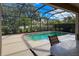 Enjoy the view from the poolside patio with seating at 1269 Western Pine Cir, Sarasota, FL 34240