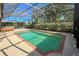 Relaxing pool area with a covered lanai, hot tub, and patio furniture at 1269 Western Pine Cir, Sarasota, FL 34240
