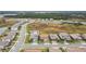 Aerial view of house and surrounding neighborhood at 13891 Heartwood Way, Parrish, FL 34219