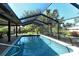 Screened-in rectangular pool with patio area at 146 Yacht Harbor Dr, Osprey, FL 34229