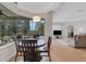 Bright breakfast nook with pool view and seating for four at 14912 Bowfin Ter, Lakewood Ranch, FL 34202