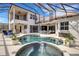 Resort-style pool and patio with outdoor kitchen at 14912 Bowfin Ter, Lakewood Ranch, FL 34202