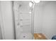 Clean bathroom with a shower and white tile at 1518 Ewing Ave, Clearwater, FL 33756