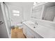 Clean bathroom with a vanity, toilet, and shower at 1518 Ewing Ave, Clearwater, FL 33756