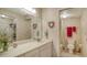 Bathroom with a vanity, toilet, and bathtub at 153 Wild Palm Dr # 153, Bradenton, FL 34210