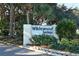 Welcoming entrance sign for Wildewood Springs community at 153 Wild Palm Dr # 153, Bradenton, FL 34210