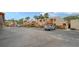 Exterior view of building and parking lot with cars at 153 Wild Palm Dr # 153, Bradenton, FL 34210