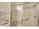 Accessible shower with glass enclosure and grab bar at 153 Wild Palm Dr # 153, Bradenton, FL 34210