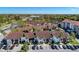Aerial view of a large community of homes with ample parking at 1618 Stickney Point Rd # 1618-202, Sarasota, FL 34231