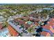 Aerial view of condo community with pool and parking at 1618 Stickney Point Rd # 1618-202, Sarasota, FL 34231