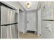 Bright entryway with view into kitchen and living room at 1618 Stickney Point Rd # 1618-202, Sarasota, FL 34231