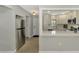 Modern kitchen with stainless steel appliances and white cabinets at 1618 Stickney Point Rd # 1618-202, Sarasota, FL 34231