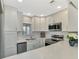 Updated kitchen, white cabinets, stainless steel appliances at 1618 Stickney Point Rd # 1618-202, Sarasota, FL 34231