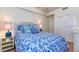 Main bedroom with a queen bed and nightstands at 17520 Gawthrop Dr # 102, Bradenton, FL 34211
