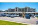 Exterior view of a modern apartment building with parking at 17520 Gawthrop Dr # 102, Bradenton, FL 34211