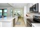 Modern kitchen featuring stainless steel appliances and an expansive island at 17520 Gawthrop Dr # 102, Bradenton, FL 34211