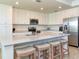 Modern kitchen boasts stainless steel appliances and an island at 17520 Gawthrop Dr # 102, Bradenton, FL 34211