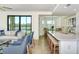 Open concept kitchen and dining area with lake views at 17520 Gawthrop Dr # 102, Bradenton, FL 34211