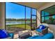 Screened lanai overlooking a peaceful lake at 17520 Gawthrop Dr # 102, Bradenton, FL 34211
