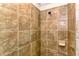 Large tiled shower with built-in soap dish at 17520 Gawthrop Dr # 102, Bradenton, FL 34211