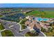 Aerial view of community with resort-style amenities including pool and tennis at 17724 Gawthrop # 103, Bradenton, FL 34211