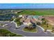 Aerial view showing clubhouse, pool, tennis courts, and residential area at 17724 Gawthrop # 103, Bradenton, FL 34211