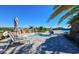 Relaxing community pool with a spa and waterfall feature at 17724 Gawthrop # 103, Bradenton, FL 34211