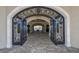 Ornate iron gates leading into a community clubhouse at 17724 Gawthrop # 103, Bradenton, FL 34211