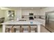 Spacious kitchen featuring a large island and white cabinetry at 17724 Gawthrop # 103, Bradenton, FL 34211