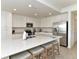 Modern kitchen with stainless steel appliances and expansive island at 17724 Gawthrop # 103, Bradenton, FL 34211