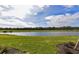 Landscaped yard with pond and golf course views at 17724 Gawthrop # 103, Bradenton, FL 34211