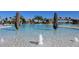 Relaxing resort-style pool with waterfalls and umbrellas at 17724 Gawthrop # 103, Bradenton, FL 34211