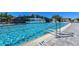 Inviting swimming pool with a rock waterfall feature at 17724 Gawthrop # 103, Bradenton, FL 34211