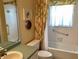 Bathroom with tub, shower, and single vanity at 1803 Ashley Dr, Venice, FL 34292
