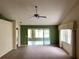 Living room with a view of the sunroom and access to other areas at 1803 Ashley Dr, Venice, FL 34292