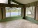 Sunroom with a stunning view of a lake or pond at 1803 Ashley Dr, Venice, FL 34292