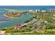 Aerial view of waterfront community with tennis courts at 240 Sands Point Rd # 4201, Longboat Key, FL 34228