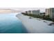 Aerial view of beachfront property with condos and beach access at 240 Sands Point Rd # 4201, Longboat Key, FL 34228