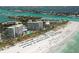 Aerial view of beachfront resort; beach and ocean at 240 Sands Point Rd # 4201, Longboat Key, FL 34228