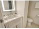 Clean bathroom with toilet and modern vanity at 240 Sands Point Rd # 4201, Longboat Key, FL 34228