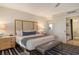 King bedroom with ensuite bathroom and walk-in closet at 240 Sands Point Rd # 4201, Longboat Key, FL 34228