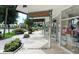 Walk along St. Armands Circle, featuring upscale shops and landscaping at 240 Sands Point Rd # 4201, Longboat Key, FL 34228