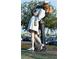 Life-size statue of a sailor kissing a nurse at 240 Sands Point Rd # 4201, Longboat Key, FL 34228