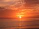 Stunning sunset over the ocean, creating a vibrant and colorful scene at 240 Sands Point Rd # 4201, Longboat Key, FL 34228