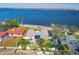 Stunning waterfront property showcasing a private pool and beautiful landscaping at 2425 Riverview Blvd, Bradenton, FL 34205