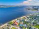 Aerial view showcasing waterfront property and surrounding houses at 2425 Riverview Blvd, Bradenton, FL 34205